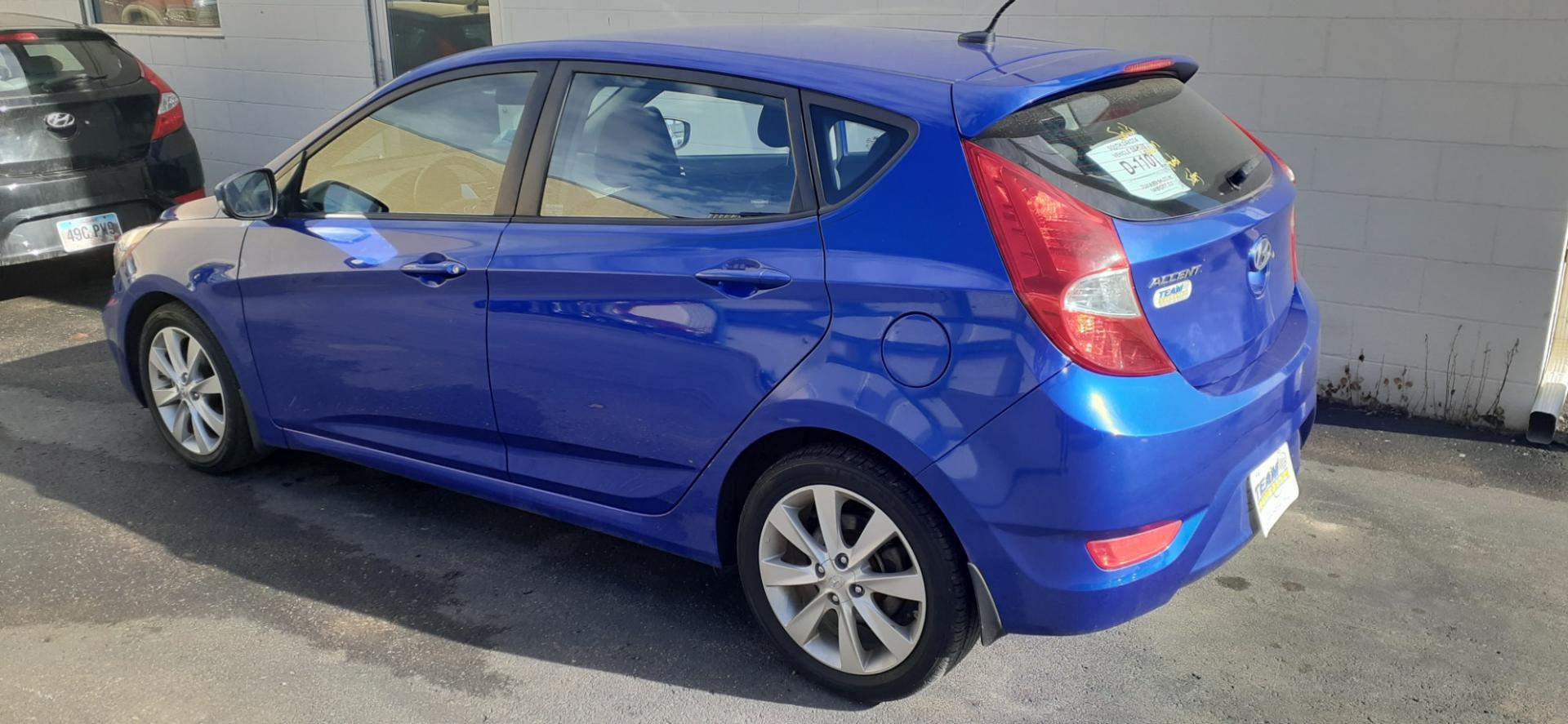 2013 Hyundai Accent SE 5-Door (KMHCU5AE2DU) with an 1.6L L4 DOHC 16V engine, located at 2015 Cambell Street, Rapid City, SD, 57701, (605) 342-8326, 44.066433, -103.191772 - CARFAX AVAILABLE - Photo#2